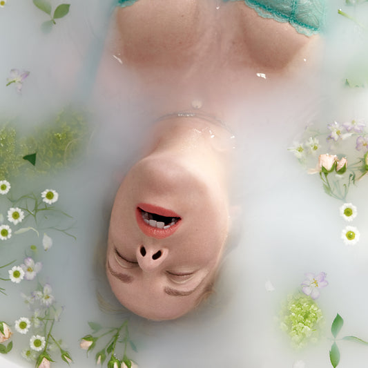 Woman having orgasm in bath